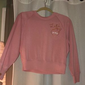 “Let’s stay in bed” pink cropped long sleeve